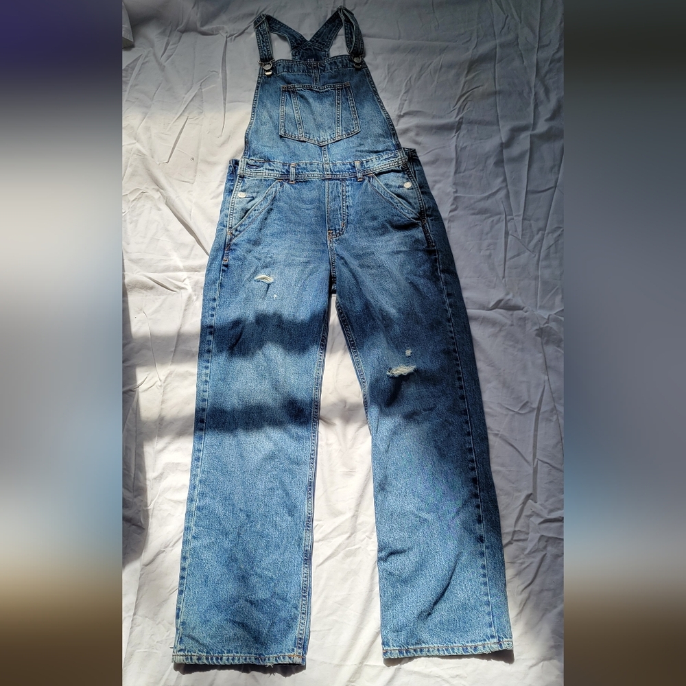 Distressed Blue Denim Jeans